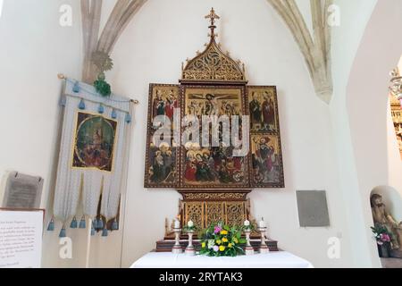 Neo-Gothic crucifix from XIX century in Late Gothic Katholische Pfarrkirche Maria Himmelfahrt (Maria am Berg) (Catholic Parish Church of the Assumptio Stock Photo