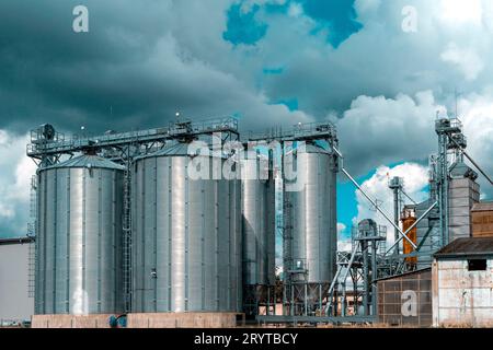 Agricultural Silos - Building Exterior, Storage and drying of grains Stock Photo