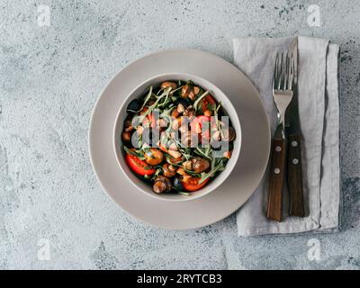 Salad with arugula, mini champignons Stock Photo