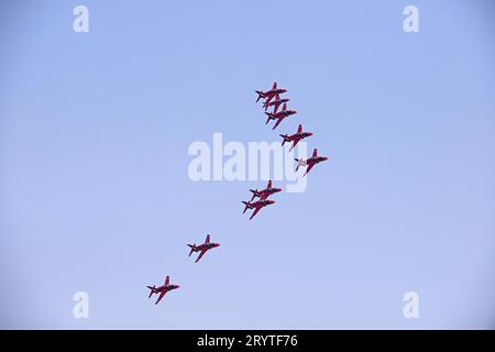 The RED ARROWS flying over Liverpool John Lennon Airport in formation en route to BLACKPOOL, their base for the SOUTHPORT AIRSHOW Stock Photo