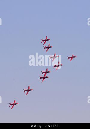 The RED ARROWS flying over Liverpool John Lennon Airport in formation en route to BLACKPOOL, their base for the SOUTHPORT AIRSHOW Stock Photo