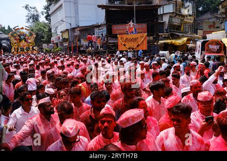 Pune, India - September 29, 2023, Guruji Talim Ganpati, Pune Ganpati Visarjan Procession with The Rhythm of Traditional Dhol Tasha Music. Stock Photo