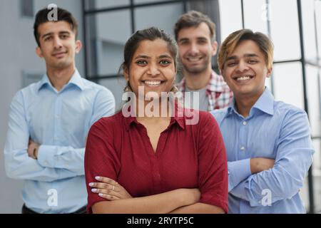 Theyre all about their business. Shot of a group of businesspeople standing in an office at work. Stock Photo