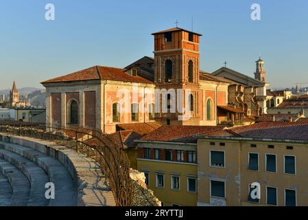 Cripta Chiesa di San Nicolò all'Arena from the Roman amphitheatre/Arena of Verona and other towers, Italy, early morning on New Year's Eve, 2016 Stock Photo