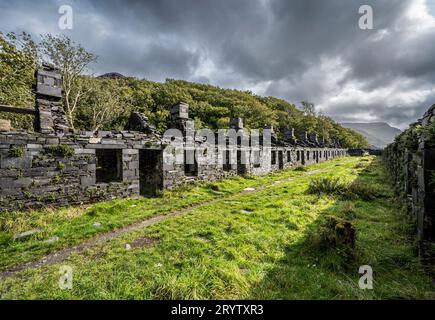 These are Anglesey Barracks miners cottages at the abandoned Dinorwig slate quarry near the Welsh village of Llanberis in Snowdonia National Park Stock Photo