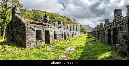 These are Anglesey Barracks miners cottages at the abandoned Dinorwig slate quarry near the Welsh village of Llanberis in Snowdonia National Park Stock Photo