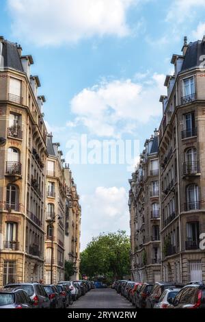 Paris classic apartment building alleyway view with typical Parisian ...