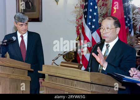 Chinese Finance Minister Liu Zhongli, right, responds to a question during a joint press conference with U.S. Treasury Secretary Robert Rubin, left, at the Treasury Department, November 19, 1996 in Washington, D.C. Earlier the U.S Export-Import Bank announced long-term loans  for electric power projects in China. Stock Photo