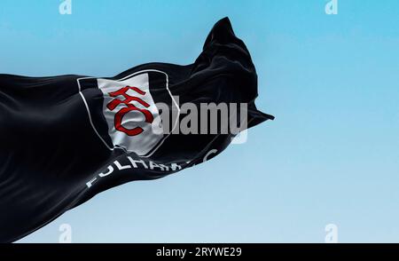 London, UK, sept 5 2023: flag of Fulham Football Club waving. Professional Football club based in London. English Premier League. Fluttering fabric. I Stock Photo