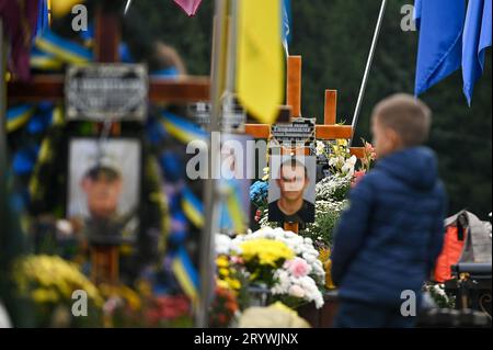 Non Exclusive: LVIV, UKRAINE - OCTOBER 01 - Graves of fallen soldiers are seen at the Lychakiv military cemetery on the Day of Defenders of Ukraine, L Stock Photo