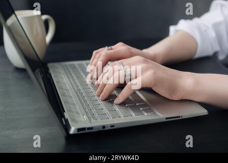 Versatile Woman Balancing Business and Learning. Working from Home, Freelancing, Online Marketing, and Office Workspace. Business woman or student Stock Photo