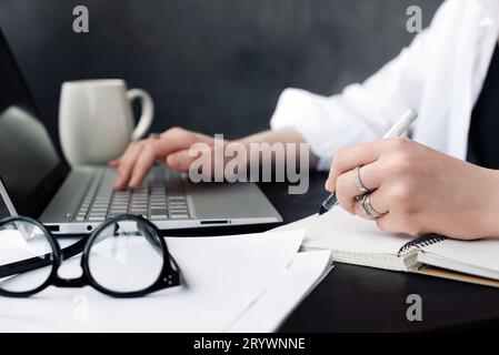 Focused Professional. Woman Journalist or Businesswoman at Work in Office. Strategic Planning. Woman Professional in Office Environment. Dedicated Stock Photo