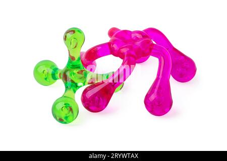 Hand-held plastic body massagers of various shapes isolated on white background Stock Photo