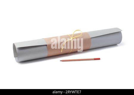 Pastel sheet rolled into a roll and sanguine pencil isolated on white background Stock Photo
