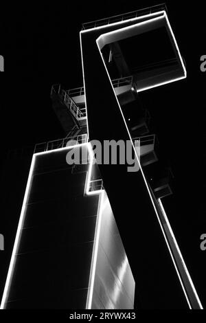 Vertical grayscale low angle shot of the Schlaegel and Eisen colliery. Herten, Germany Stock Photo