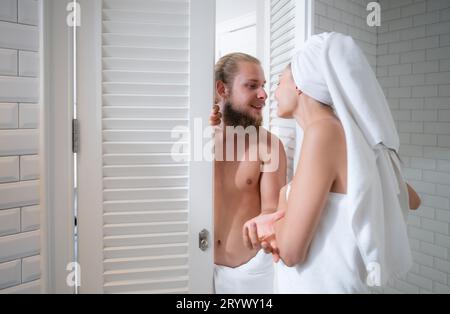 Young couple in love, man and woman in the bathroom after shower Stock Photo