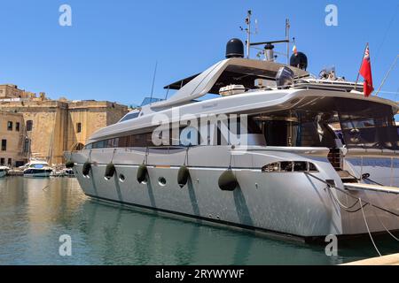Valletta, Malta - 3 August 2023: Luxury super yacht Naughty by Nature moored in the harbour in Three Cities in the island's capital, Valletta Stock Photo