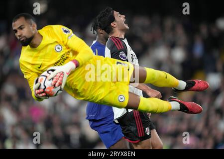 Chelsea's goalkeeper Robert Sanchez makes a save against Fulham's Raul ...