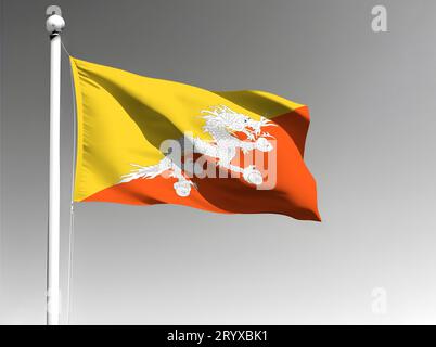 Bhutan national flag isolated waving on gray background Stock Photo