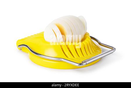 Boiled egg in the egg slicer. Stock Photo