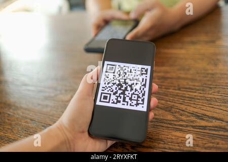 Qr code payment. E wallet. Man scanning tag accepted generate digital pay without money.scanning QR code online shopping cashles Stock Photo