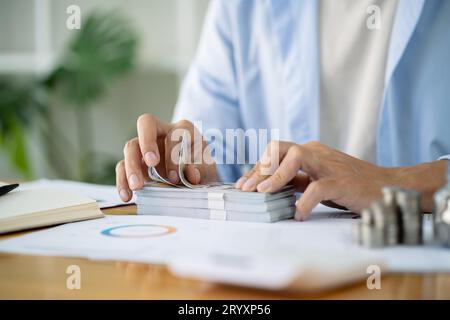 Close up of money stack coins and Dollar banknotes Saving money financial banking concept Stock Photo