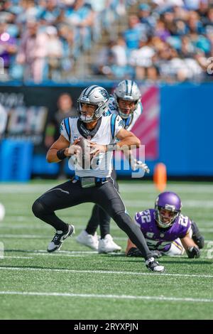 Charlotte, NC USA: Carolina Panthers quarterback Bryce Young (9) scrambles out of the pocket during an NFL game against the Minnesota Vikings at Bank Stock Photo