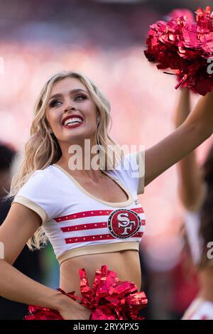 Oct 1, 2023; Santa Clara, CA, USA;  San Francisco 49ers cheerleader smiles during the third quarter against the Arizona Cardinals at Levi’s Stadium.  (Stan Szeto/Image of Sport) Stock Photo