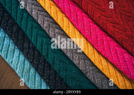 Multi colored Knitted woolen Â fabric texture background for winter. Stock Photo