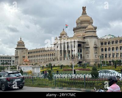 Exclusive day shots of Vidhana Soudha building with traffic on a overcast day Stock Photo