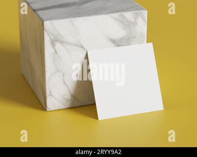 White square shape paper mockup on yellow gold isolated background with marble stone cube. Branding presentation template print. Stock Photo