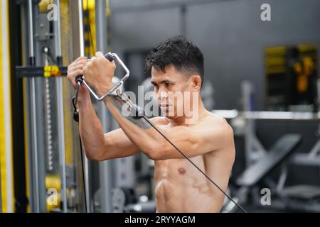 Mixed martial arts fighter going to the gym to build strong muscles To ...