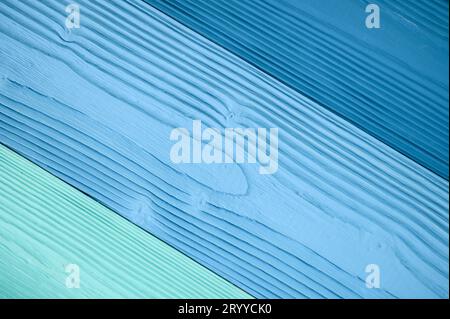 Top diagonal view of blue wooden textured background backdrop. Abstract wallpaper pastel blue ocean color Stock Photo