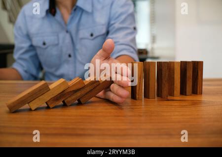 Planning risk and strategy in businessman gambling placing wooden block.Business concept for growth success process Stock Photo