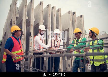 Construction engineer and construction foreman Monitor the progress and supervise important construction works on the constructi Stock Photo