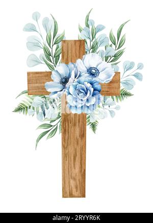 Floral cross. Wooden cross with blue flowers, fern, eucalyptus twigs ...