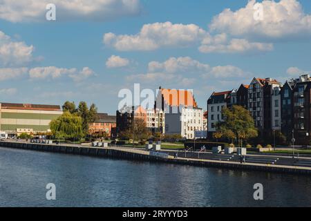 Elblag, Poland - August 2022. St. Nicholas Cathedral Gothic tower View on the Market Gate and the main cathedral street of old t Stock Photo