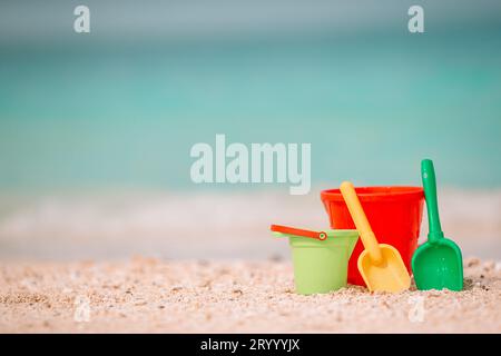 Beach kid's toys on white sand beach Stock Photo