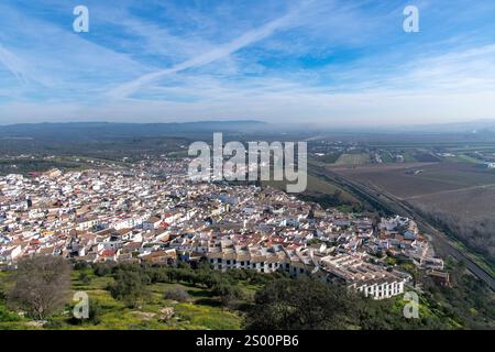 Panoramic high level view over the city of Almodovar del Rio, Cordoba, Andalusia, Spain with characteristic white houses and view over the agricultura Stock Photo