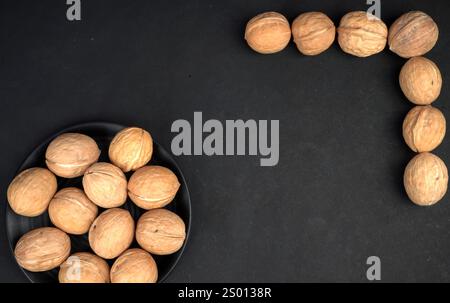 Closeup picture of dry walnut in black background Stock Photo