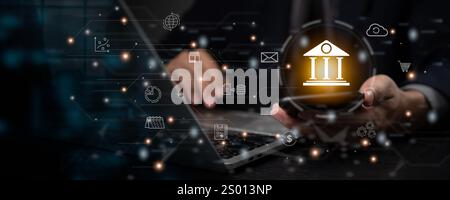 A hand holds a smartphone displaying a glowing bank icon with tech elements. Suitable for illustrating fintech, mobile banking, or digital payment fin Stock Photo