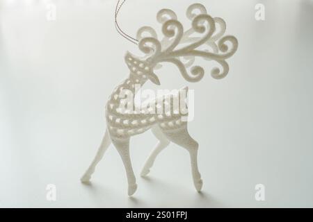 Sparkling white and silver reindeer Christmas Christmas on white background Stock Photo