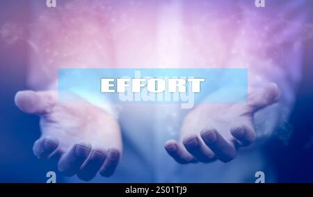 Businessman drawing on virtual screen "Effort". Stock Photo
