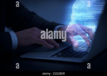 Businessman working on laptop at desk, closeup. Digital head coming out of computer symbolizing artificial intelligence Stock Photo