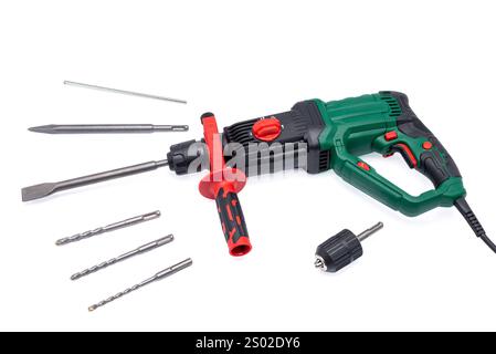Hammer drill with a set of drill bits isolated on a white background. Stock Photo