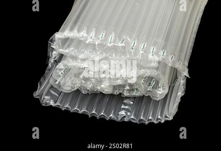 plastic translucent air packaging, protection of goods on black background Stock Photo