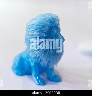3D printer printing lion figure close-up. Stock Photo