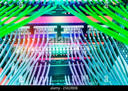 network cable connecting on network core switch close up Stock Photo