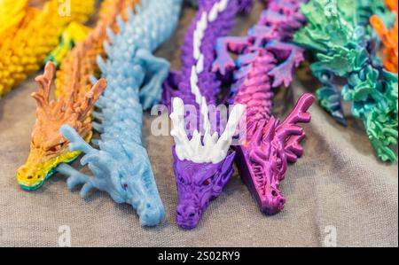 3D printer printing dragon head figure close-up. Stock Photo