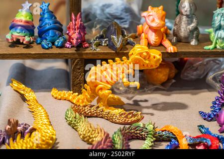 3D printer printing dragon figure close-up. Stock Photo